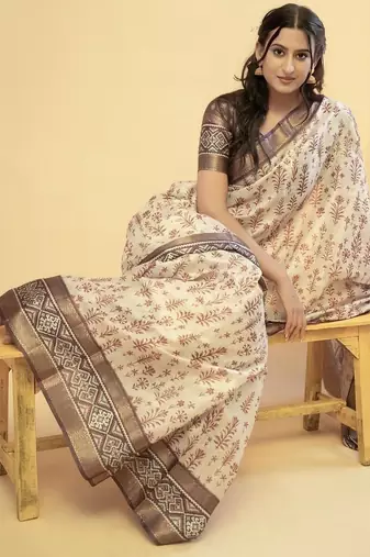 Off white polyester printed saree with blouse