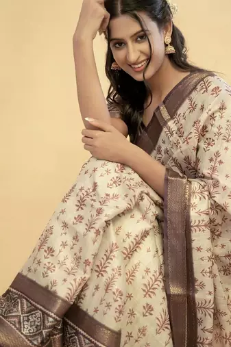Off white polyester printed saree with blouse