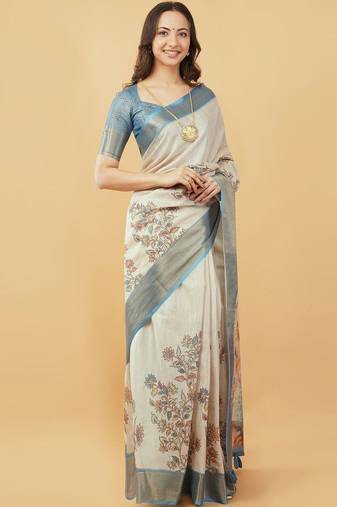 Off white polyester printed saree with blouse