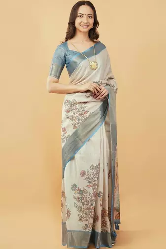 Off white polyester printed saree with blouse