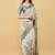 Off white polyester printed saree with blouse