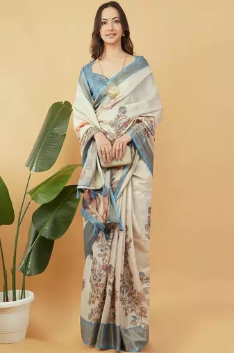 Off white polyester printed saree with blouse