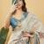 Off white polyester printed saree with blouse
