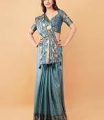 Teal polyester woven design saree with blouse