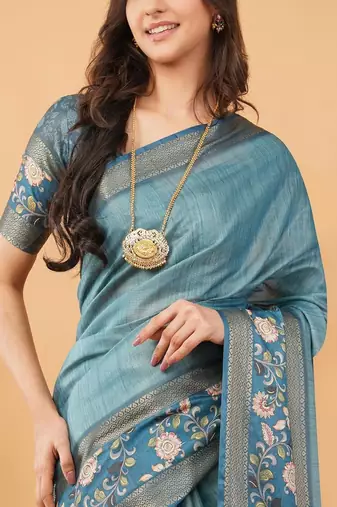 Teal polyester woven design saree with blouse