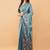 Teal polyester woven design saree with blouse