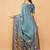 Teal polyester woven design saree with blouse