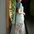 Sea green polyester printed saree with blouse