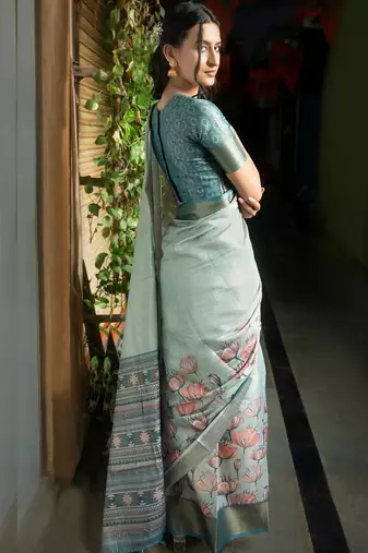 Sea green polyester printed saree with blouse