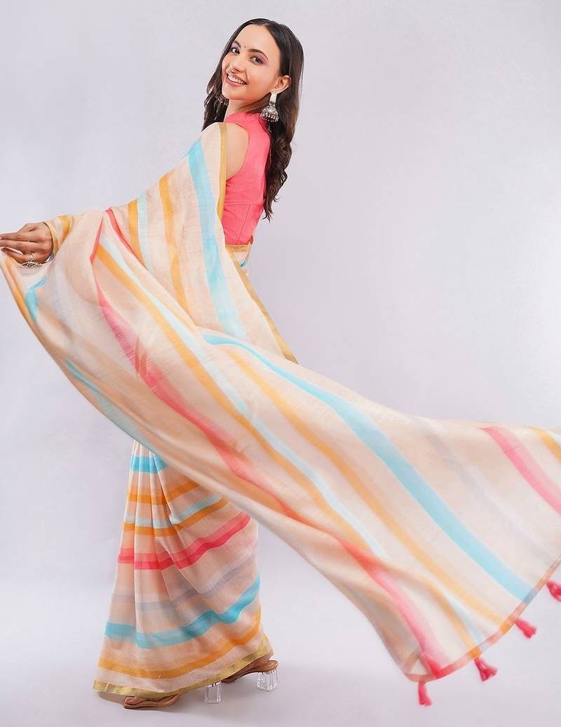 Off white pure linen striped saree with blouse