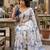 White pure linen printed saree with blouse