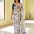 White pure linen printed saree with blouse