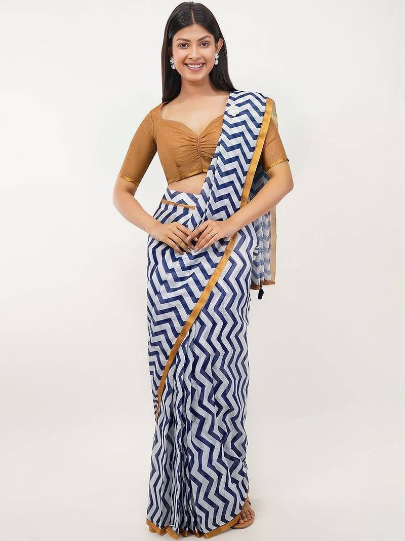 White pure linen printed saree with blouse