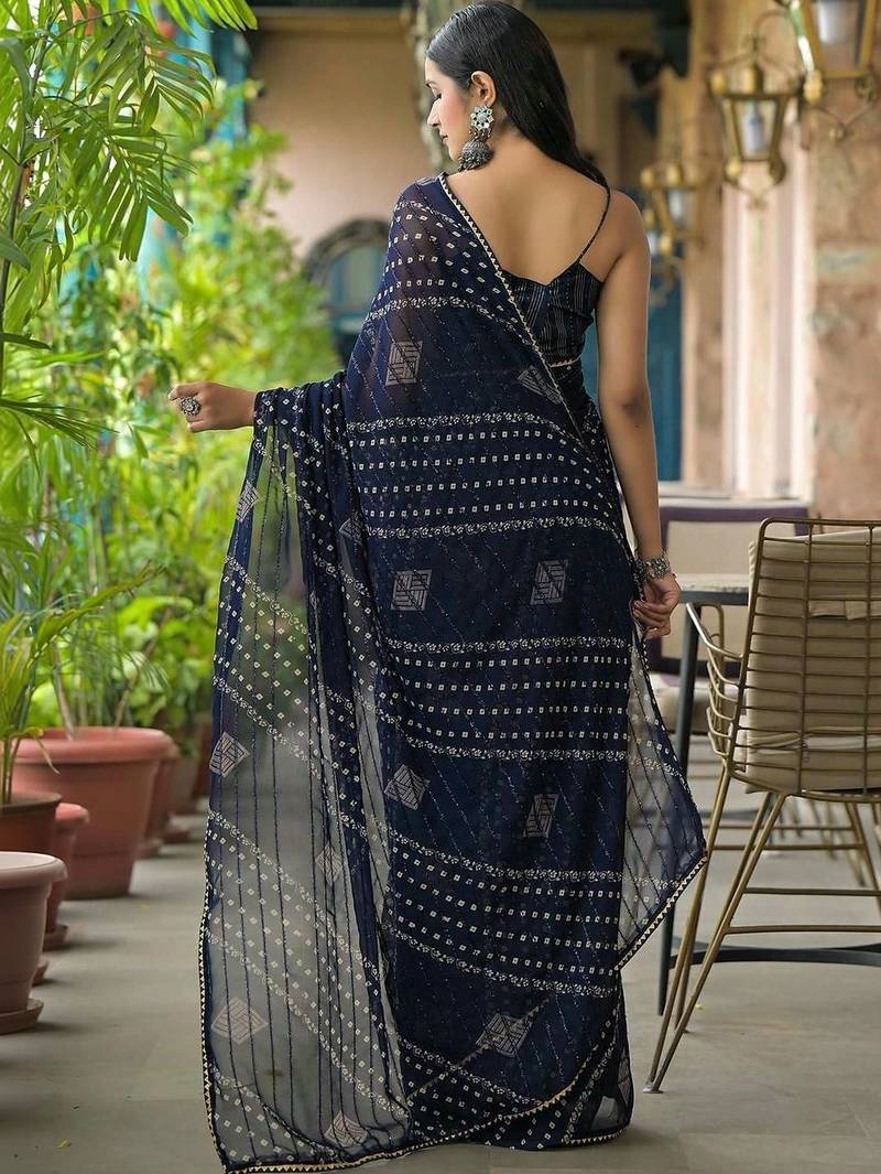 Navy blue pure georgette printed saree with blouse