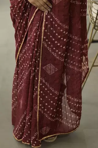 Maroon pure georgette printed saree with blouse