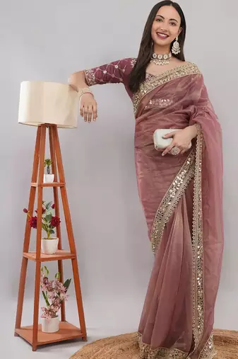 Pink net embellished saree with blouse