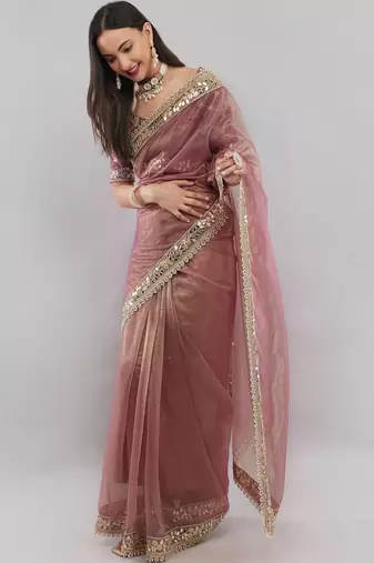 Pink net embellished saree with blouse