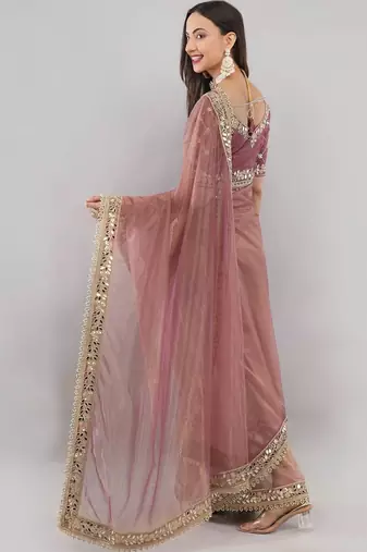 Pink net embellished saree with blouse