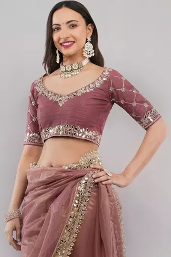 Pink net embellished saree with blouse