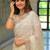 Off white pure chiffon solid saree with blouse