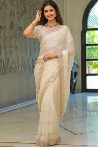 Off white pure chiffon solid saree with blouse