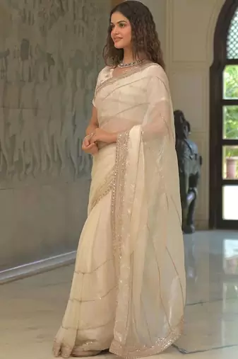 Off white pure chiffon solid saree with blouse