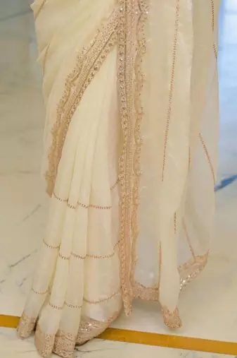 Off white pure chiffon solid saree with blouse