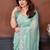 Sea green georgette embroidered saree with blouse