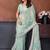 Sea green georgette embroidered saree with blouse