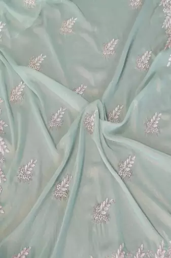 Sea green georgette embroidered saree with blouse