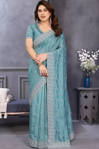 Teal silk blend embroidered saree with blouse