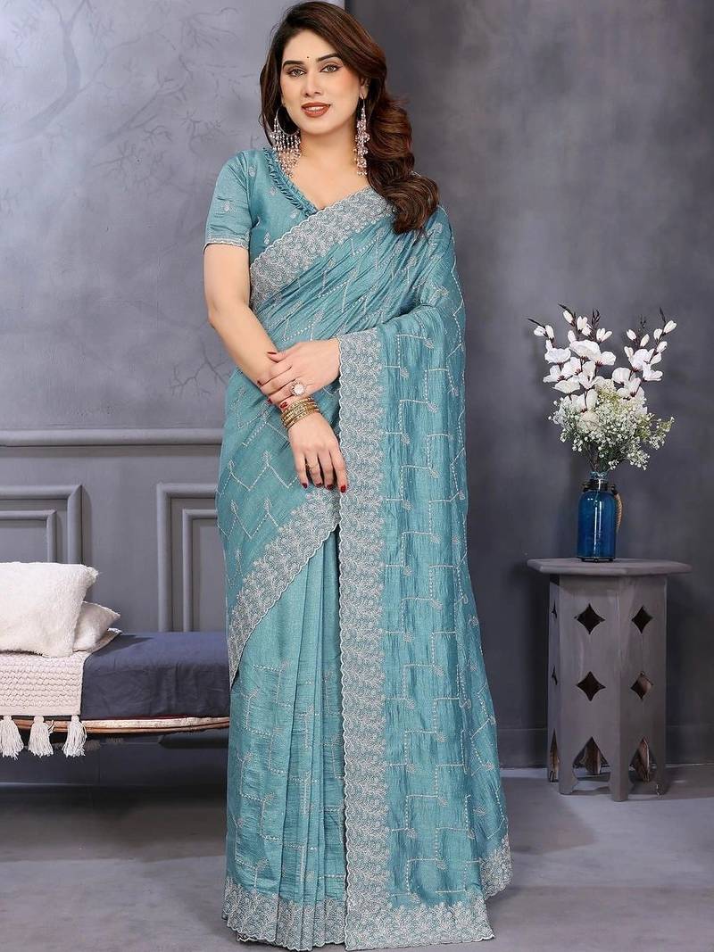 Teal silk blend embroidered saree with blouse