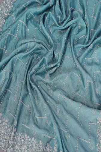 Teal silk blend embroidered saree with blouse