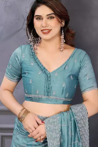 Teal silk blend embroidered saree with blouse