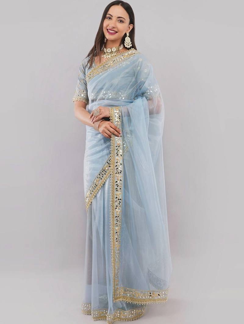 Blue net embellished saree with blouse