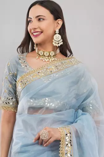Blue net embellished saree with blouse