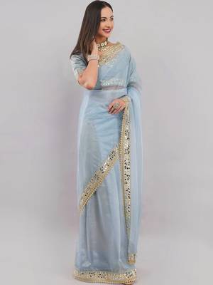 Blue net embellished saree with blouse 3