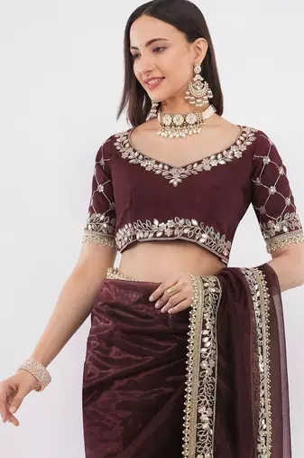Maroon net embellished saree with blouse