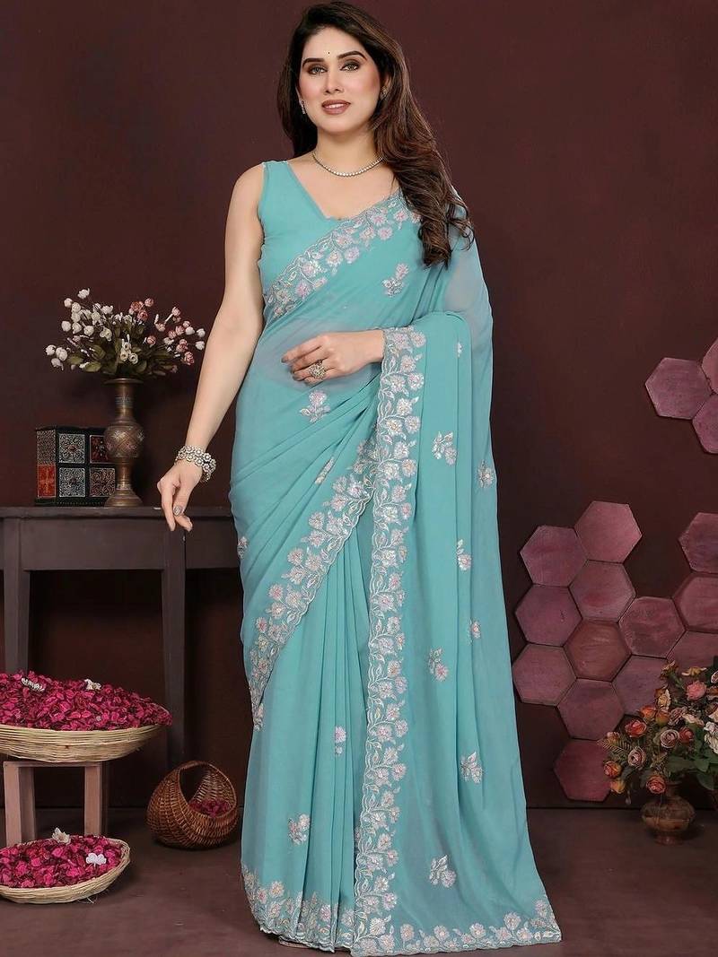 Turquoise pure georgette embroidered saree with blouse