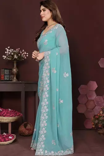 Turquoise pure georgette embroidered saree with blouse