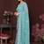 Turquoise pure georgette embroidered saree with blouse