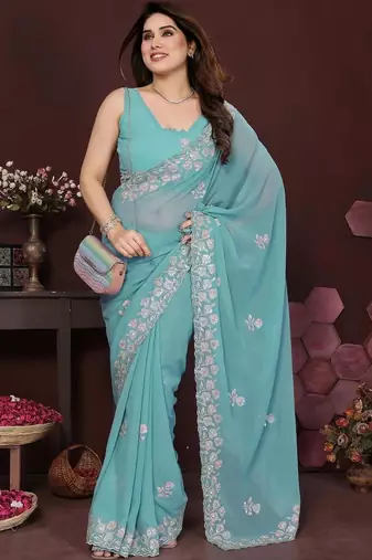 Turquoise pure georgette embroidered saree with blouse