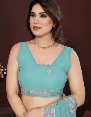 Turquoise pure georgette embroidered saree with blouse 5