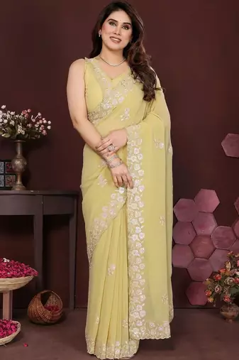 Yellow pure georgette embroidered saree with blouse
