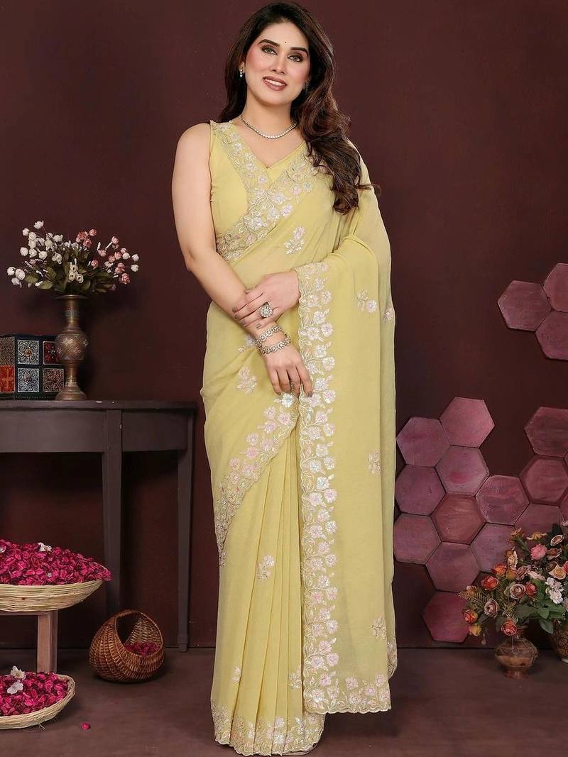 Yellow pure georgette embroidered saree with blouse