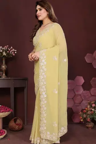 Yellow pure georgette embroidered saree with blouse