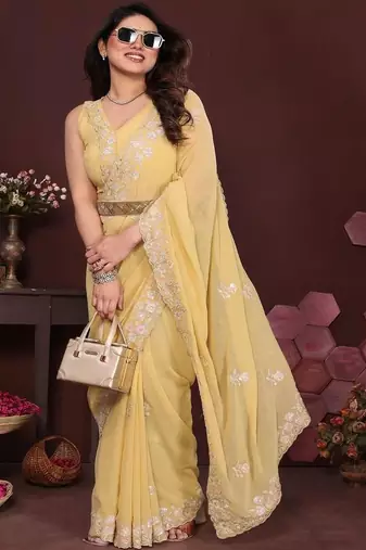 Yellow pure georgette embroidered saree with blouse