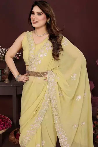 Yellow pure georgette embroidered saree with blouse