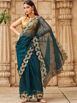 Teal net embroidered saree with blouse 1