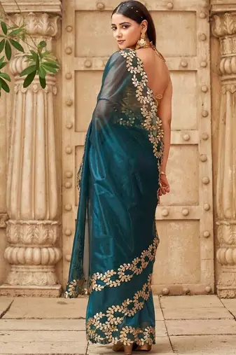 Teal net embroidered saree with blouse